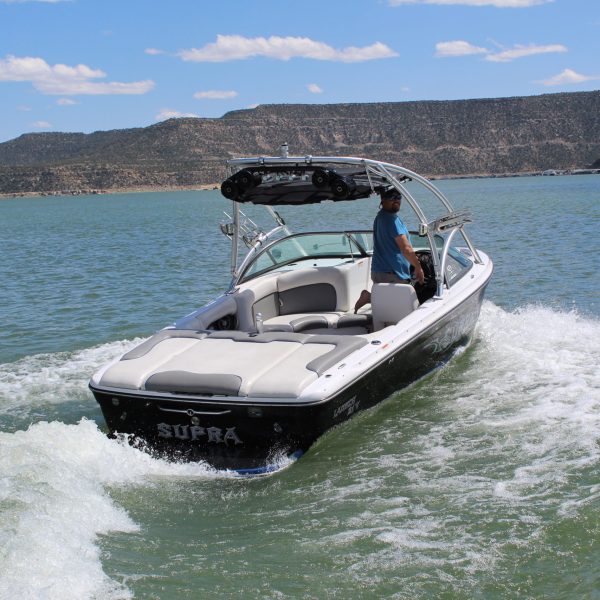 A boat is moving slowly on Lake Nighthorse near Durango, Colorado