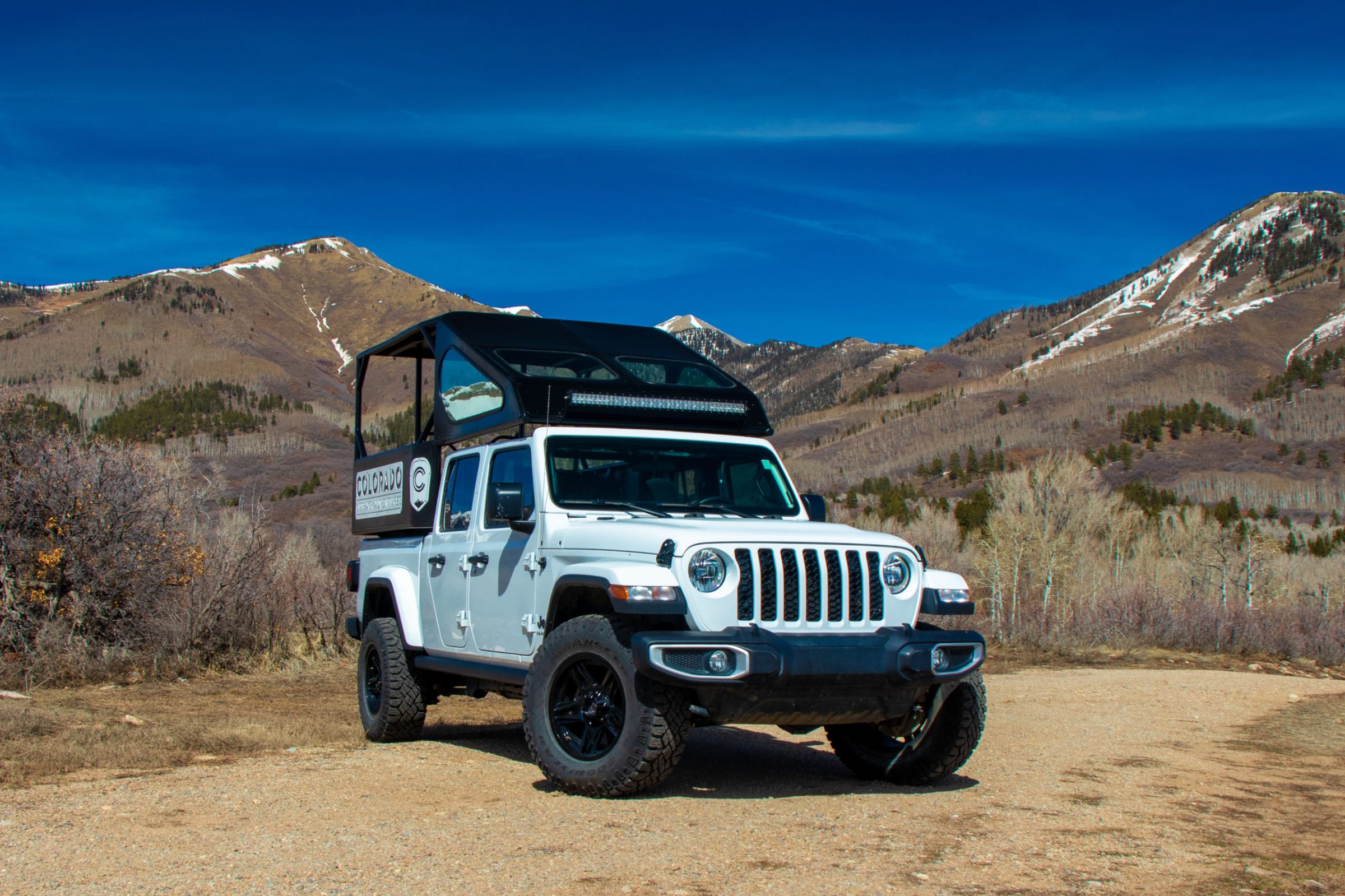 Durango Jeep Tours A jeep sits on a forest road in the mountains of Southwest Colorado