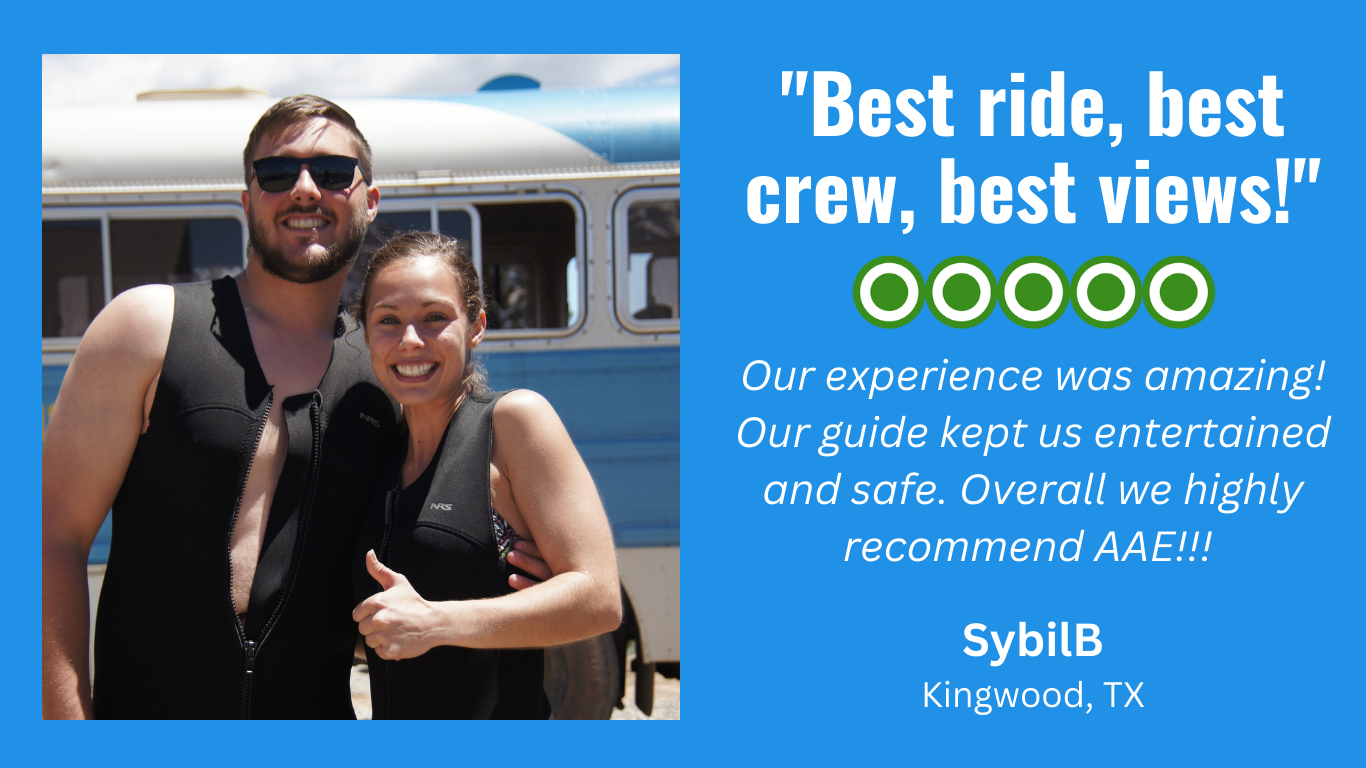 a person holding a sign posing for the camera