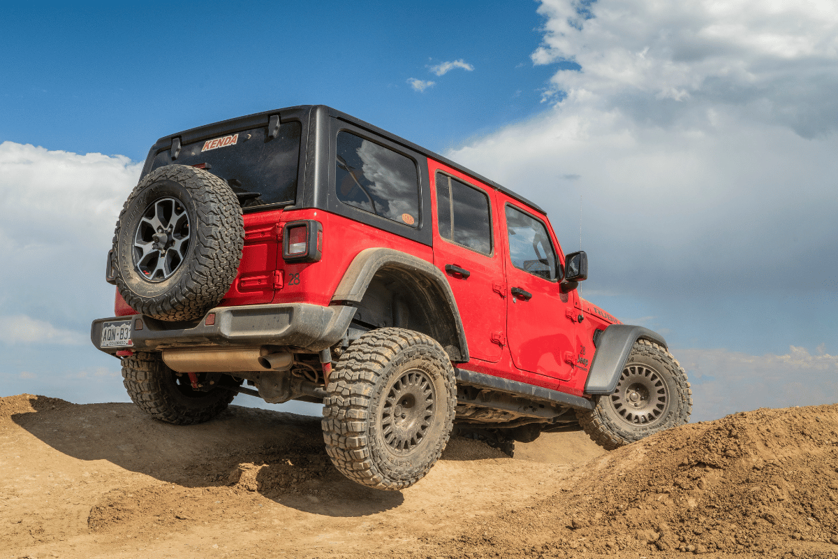 ohv and off-roading near durango a red jeep on an uneven dirt road